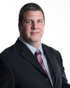 Portrait of Corey Rasmussen